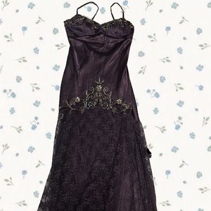 Purple beaded and lacey prom dress.